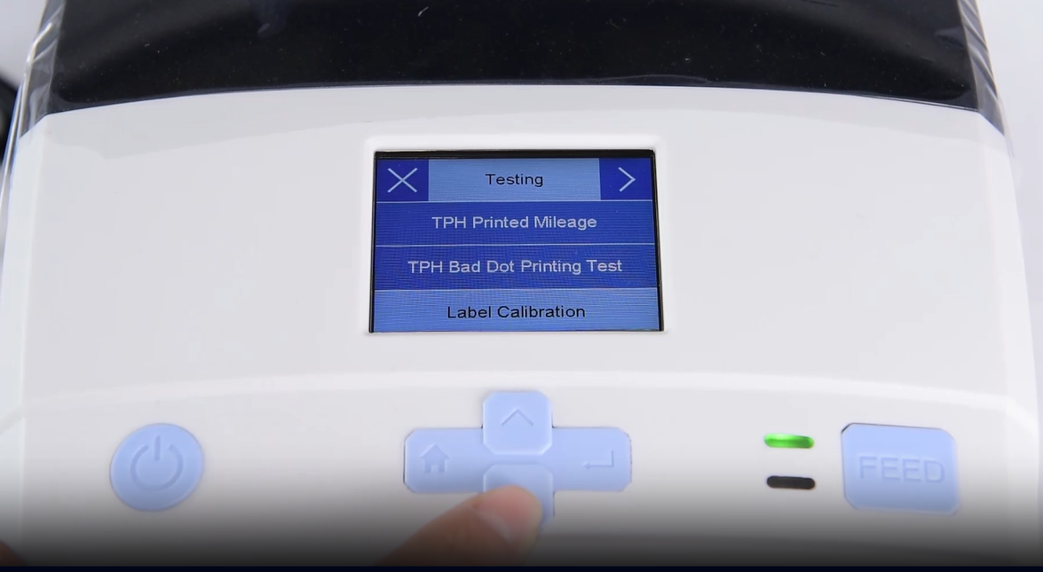 Zajednička close-up of a machine's digital interface showing a testing menu.